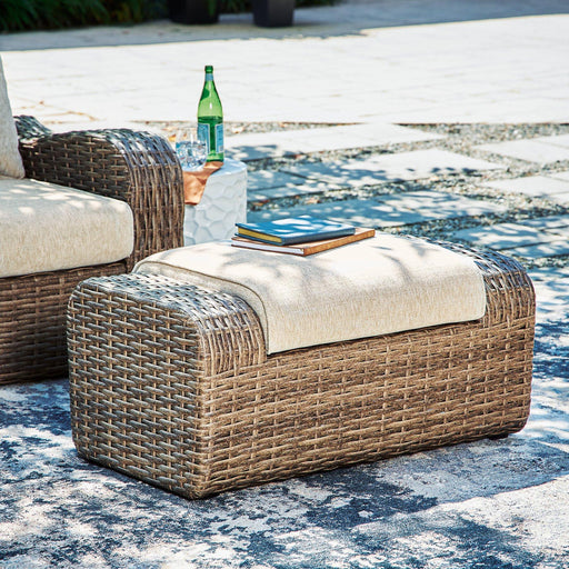 Sandy Bloom Outdoor Ottoman with Cushion image